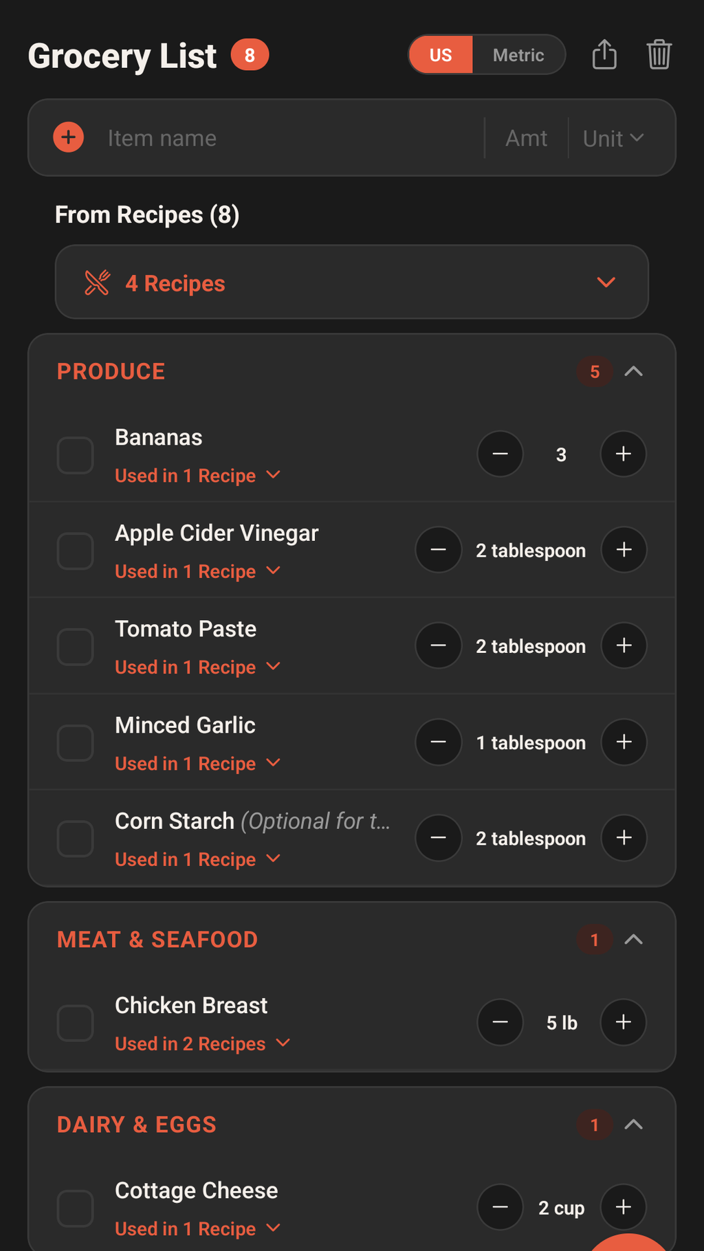 The app's grocery list grouped into Produce, Meat and Seafood and Dairy and Eggs aisles